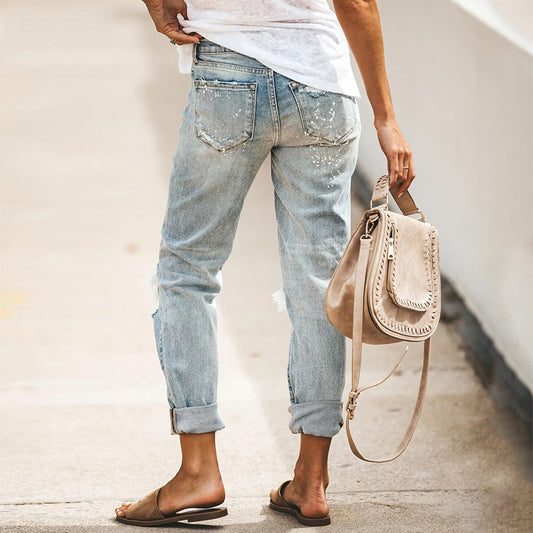 Two Ripped Knee Slim Fit Jeans
