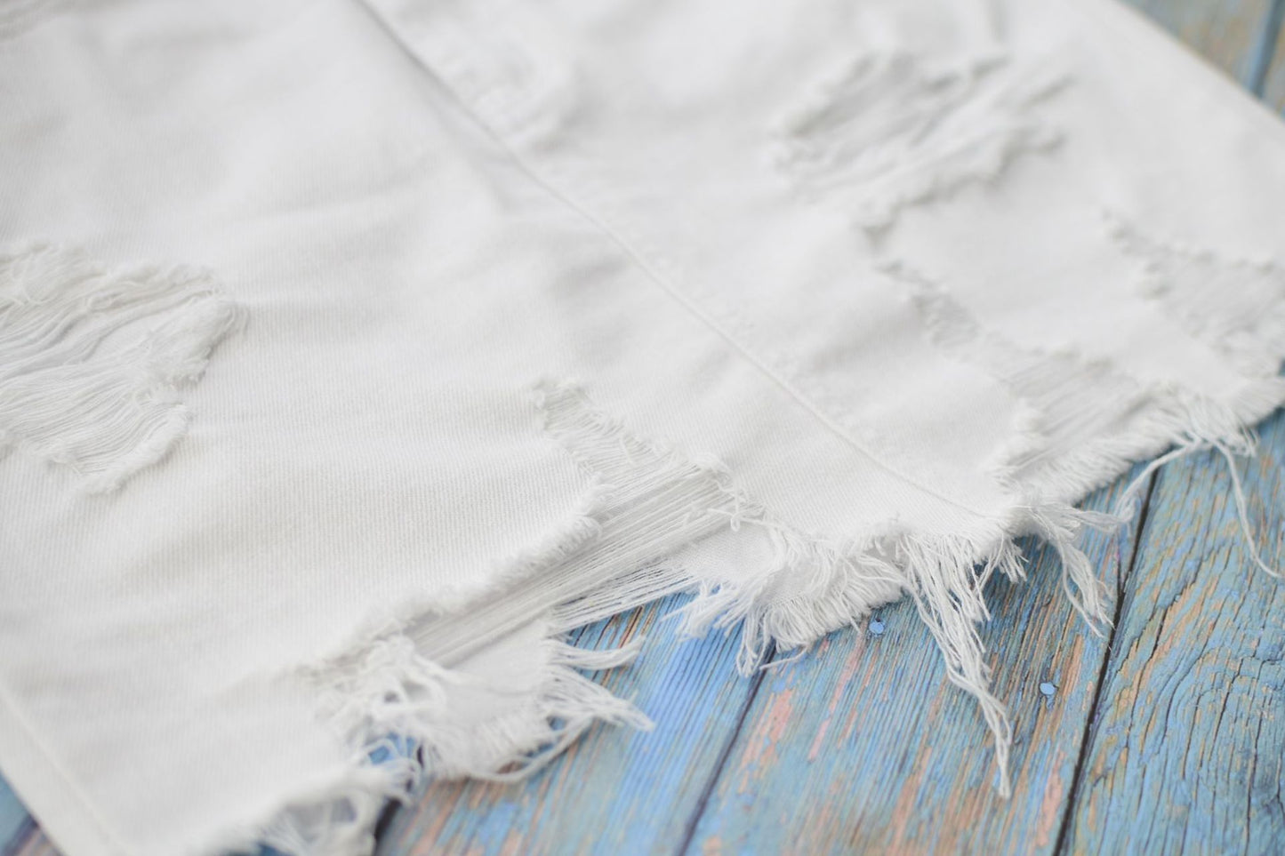 White HIGH WAIST RIPPED DENIM SKIRTS