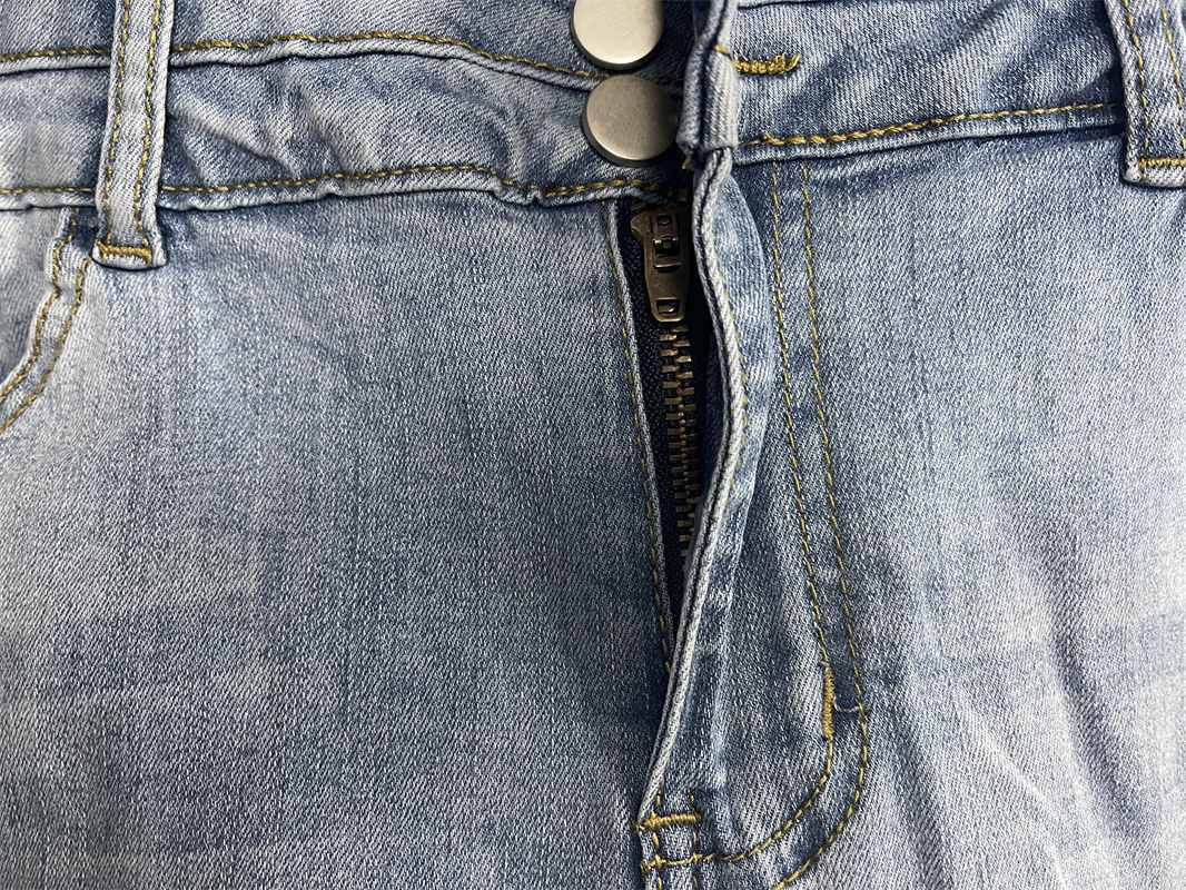 Double Button Cuff Ripped Jean Shorts