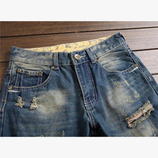 Slim fit medium wash Ripped Denim