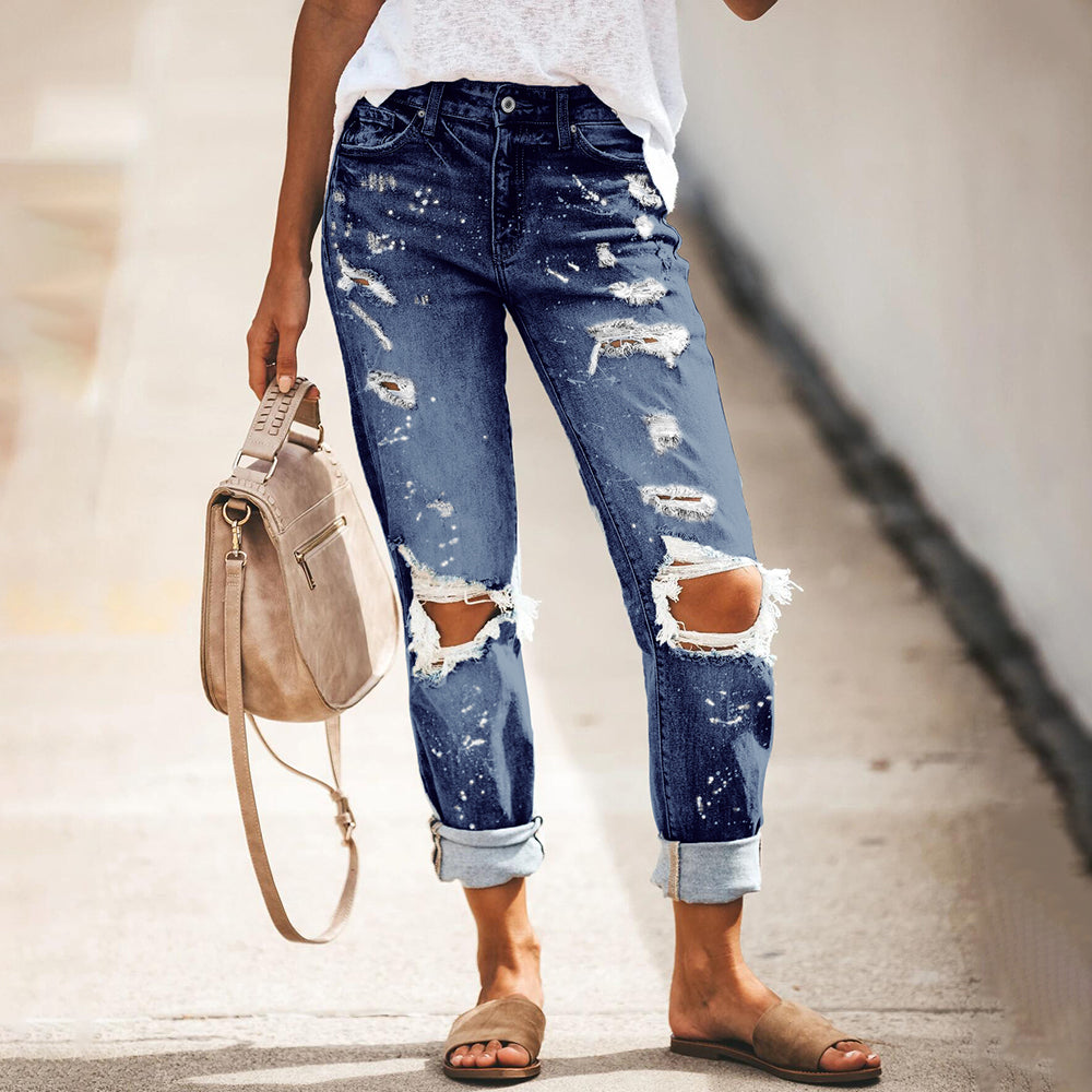 Two Ripped Knee Slim Fit Jeans