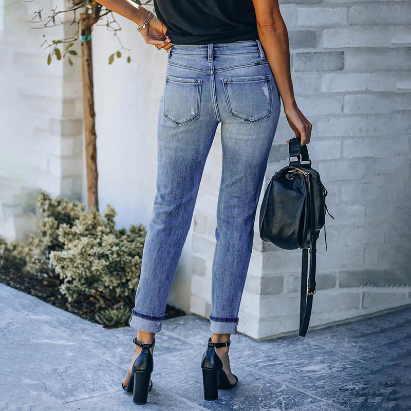 One Ripped Knee Slim Jeans